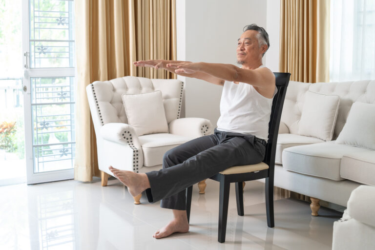 Elderly Man Using Resistance Bands for Exercise