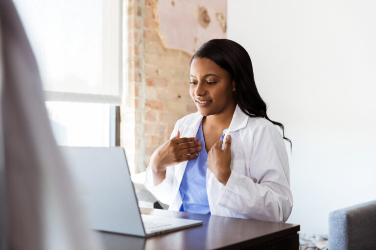 Female Doctor Using Laptop for Online Video Consultation