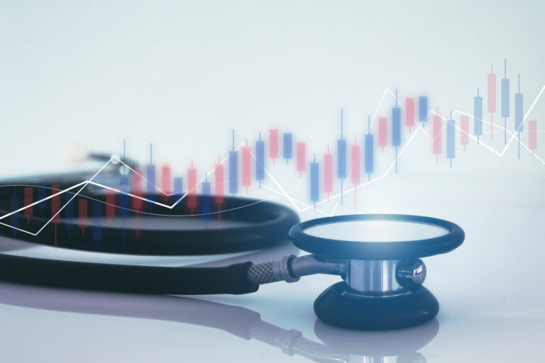 Stethoscope and financial graph, healthcare business
